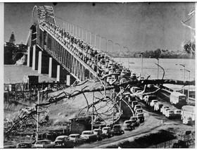 Auckland Harbour Bridge with heavy traffic two weeks after it opened, 1959.